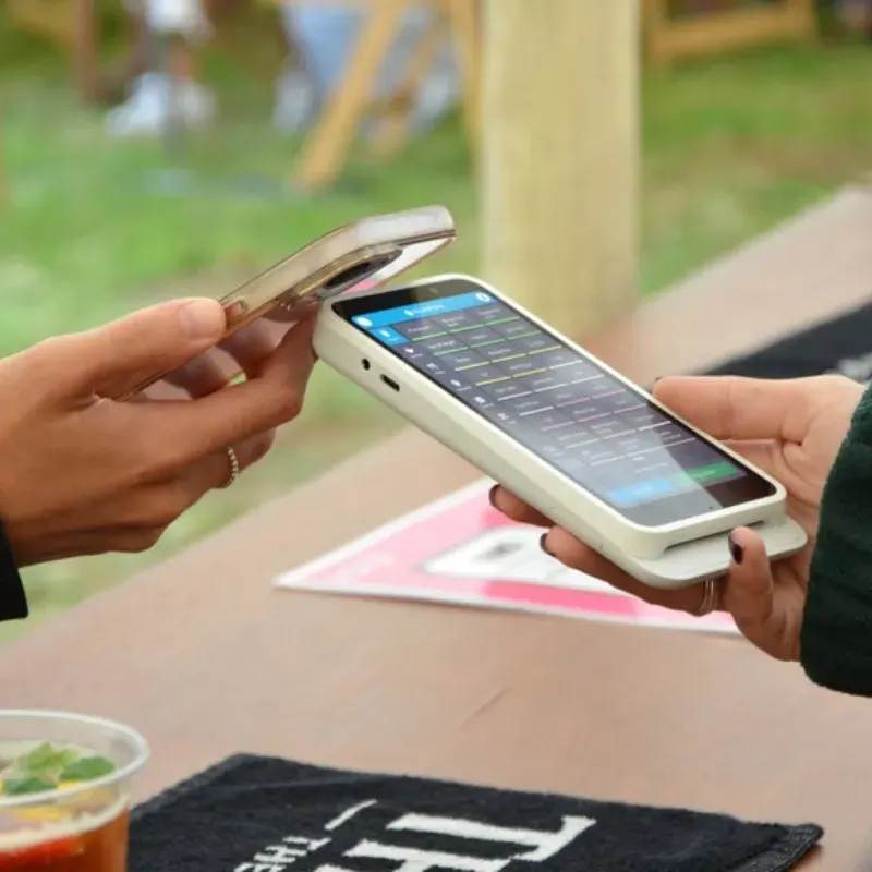 Handheld EPOS terminal taking a card payment